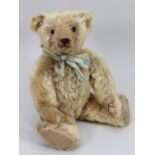 An early J.K Farnell golden mohair Teddy bear, circa 1920,