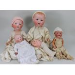 Four A.M bisque head Baby dolls,