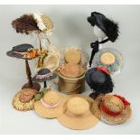 Collection of various straw and silk dolls bonnets,