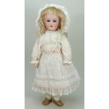 A Simon & Halbig 1248 ‘Santa’ bisque head doll, German circa 1910,