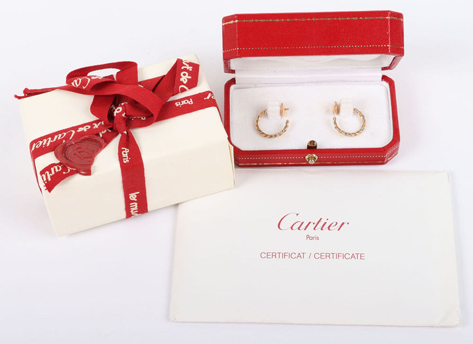 A pair of 18ct gold Cartier Trinity hoop earrings, with white, yellow and rose hoops
