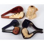 Four figural Meerschaum pipes, including a large bust of William Gladstone