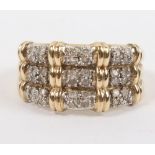 A 9ct gold and triple band diamond ring