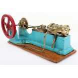 A cast iron and brass single cylinder horizontal steam engine, plaque to side ‘A.Cole, Model Maker &