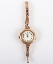 A 9ct gold ladies cocktail watch, on 9ct gold bracelet