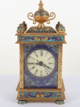 A 20th century brass and enamel mantle clock