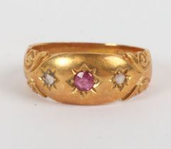 An 18ct gold, diamond and ruby ring