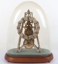 A Victorian brass skeleton clock