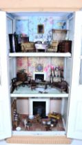 An unusual early English painted wooden dolls cupboard and contents,