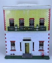 ‘Sunnyside House’ a large Silber & Fleming painted wooden dolls house and contents, circa 1890,