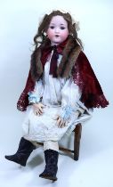 A very large A.M 390 all original companion bisque head doll, size 16, in original box, German circa