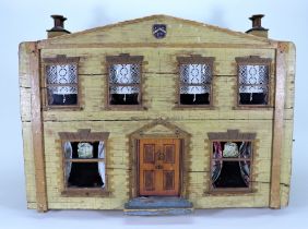 ‘Myrtle Lodge’ a painted wooden dolls house and contents, English circa 1892,