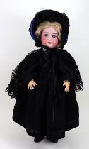 An Armand Marseille mould 390 bisque head girl doll, German circa 1905,