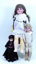 Three bisque shoulder head dolls, German circa 1910,