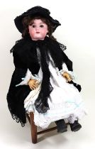 A large Heinrich Handwerck 109 DEP bisque head girl doll, German circa 1905,