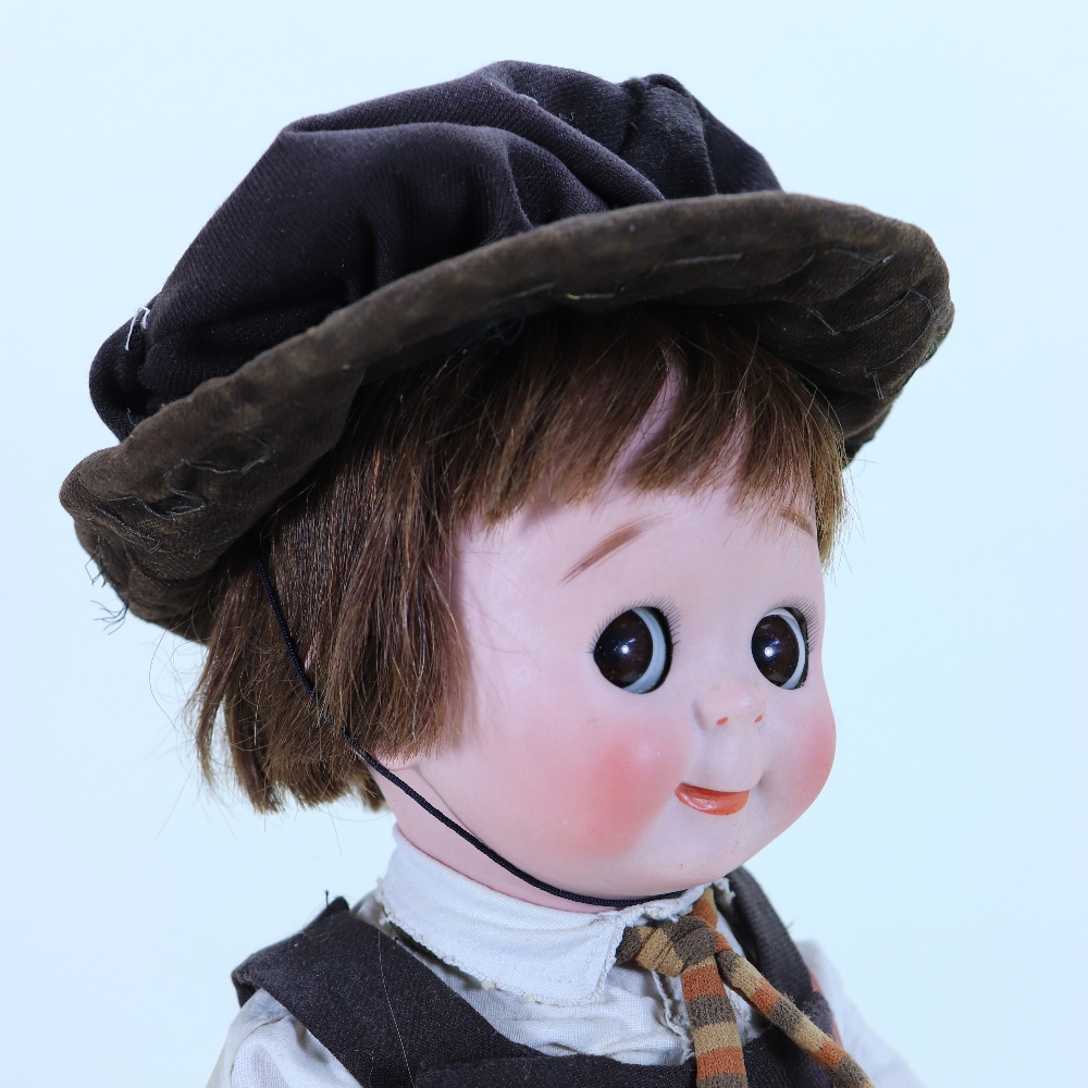 A rare large J.D Kestner 221 bisque head Googly doll in original school uniform, German circa 1911, - Image 3 of 3