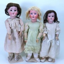 A Heubach Koppelsdorf 251 bisque head girl doll and two others, German circa 1915,