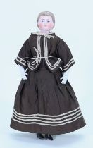A Parian-style shoulder head doll in original clothes, German circa 1865,