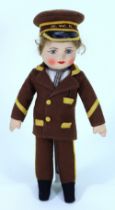 A Chad Valley cloth doll in G.W.R uniform, English 1930s,
