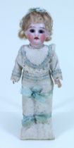 An all original A.M bisque head doll in papoose, German circa 1910,