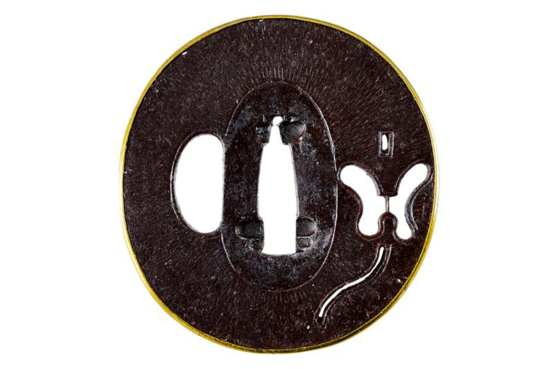 An elegant tsuba of the Umetada school