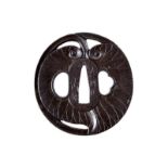 A beautiful tsuba signed Echizen Ju Kinai Saku