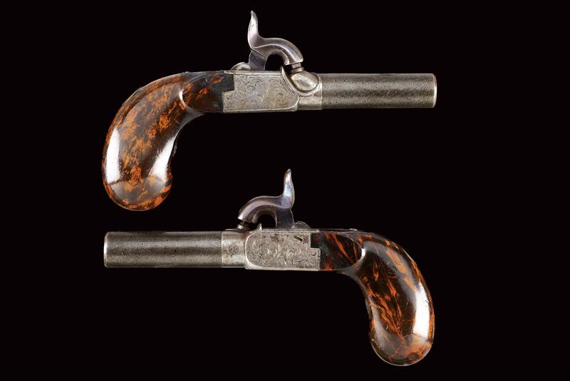 A fine pair of percussion pocket pistols