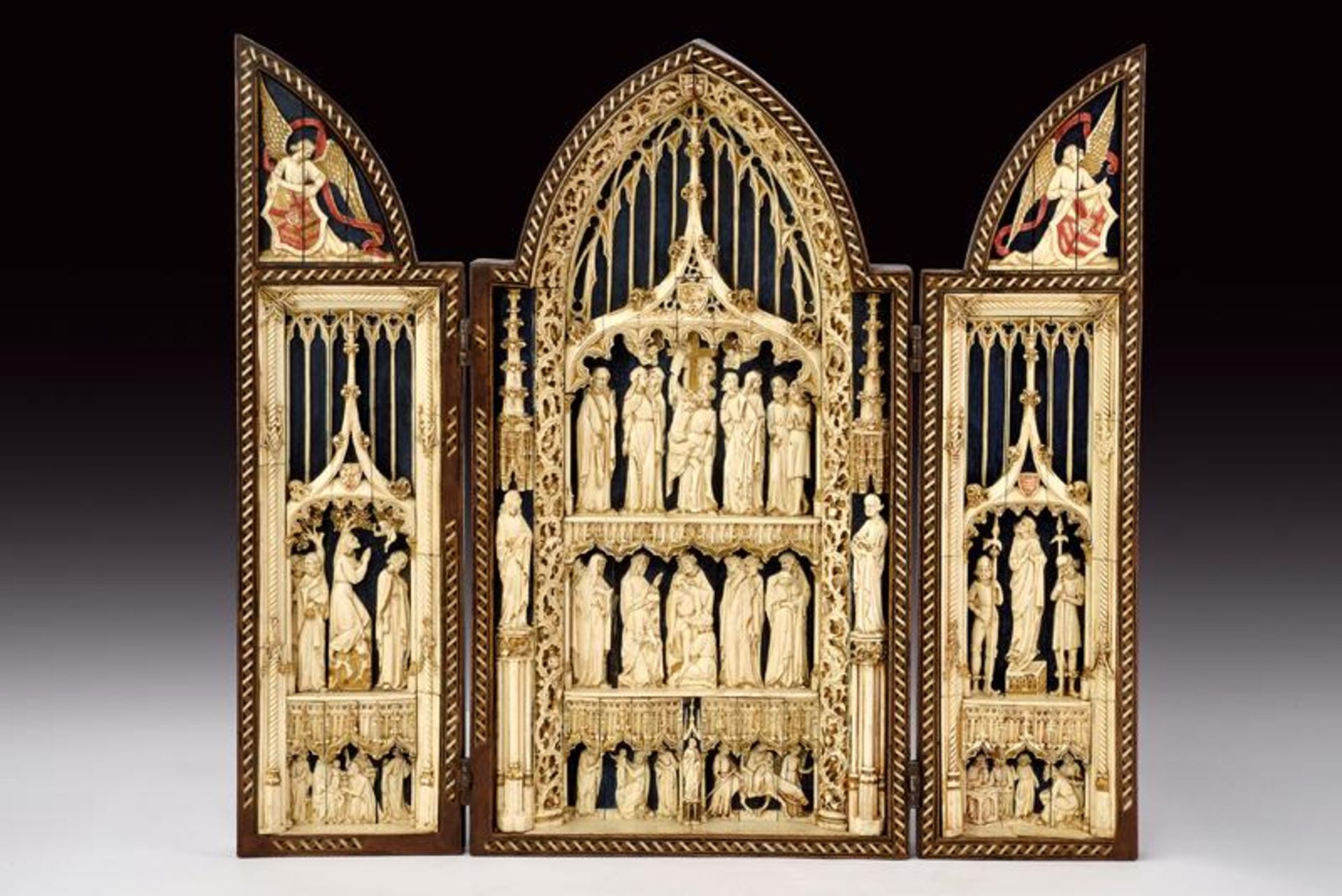 An extraordinary sculpted triptych with scenes from Christ's life