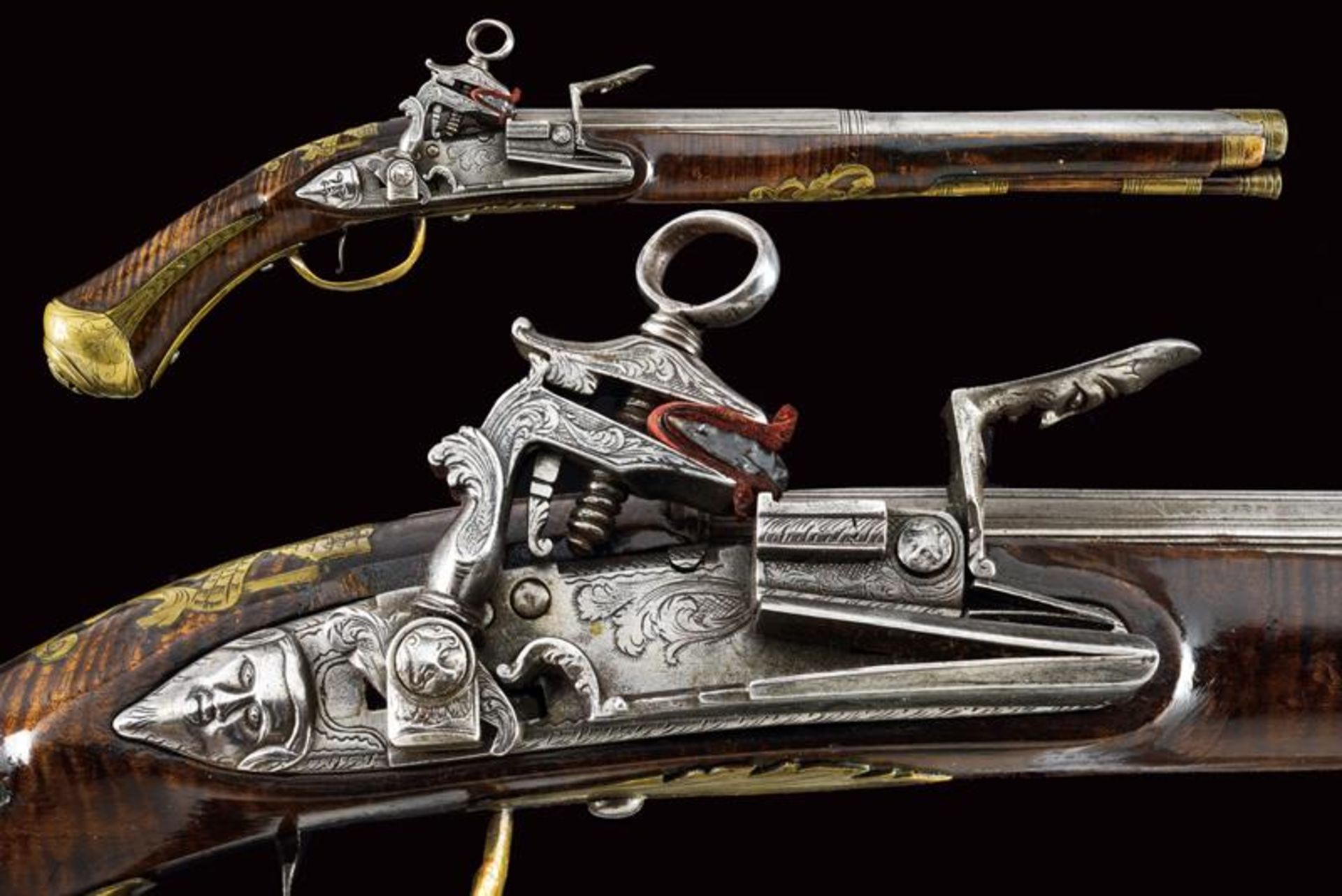 An elegant Roman-style flintlock pistol