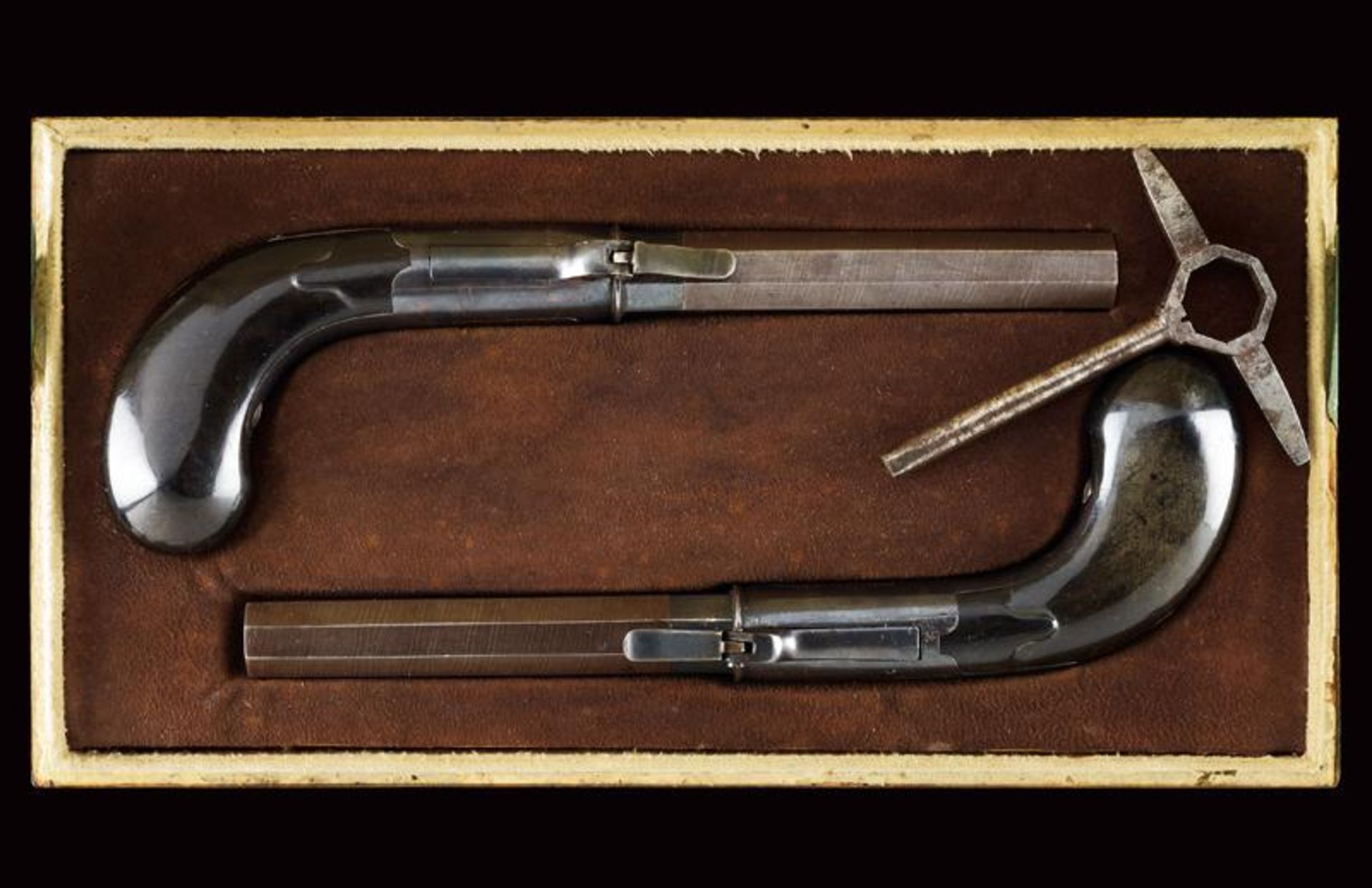 A rare pair of cased percussion pocket pistols