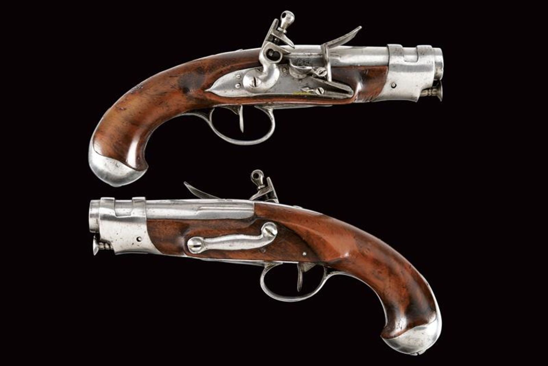 A pair of small flintlock pistols