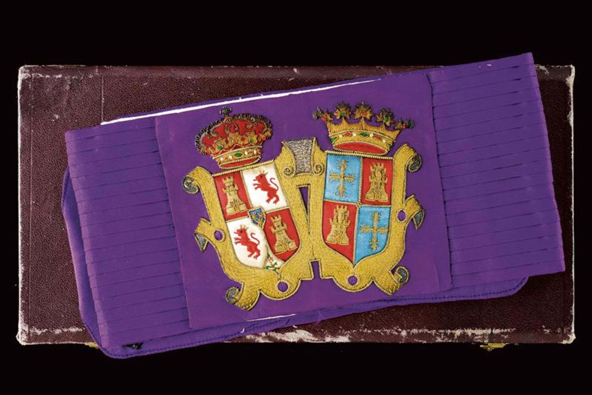 A belt with two royal coat of arms