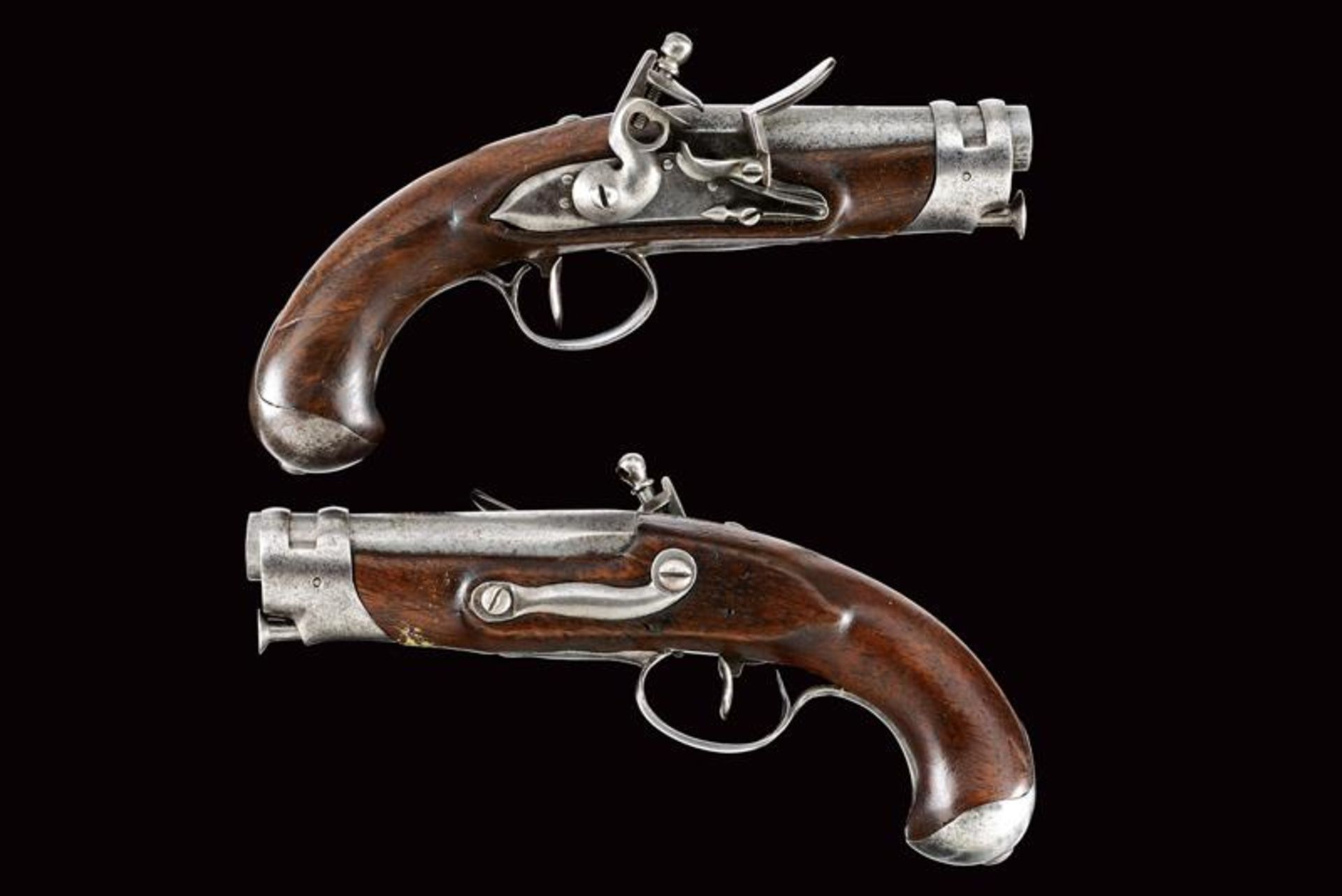 A pair of small flintlock pistols