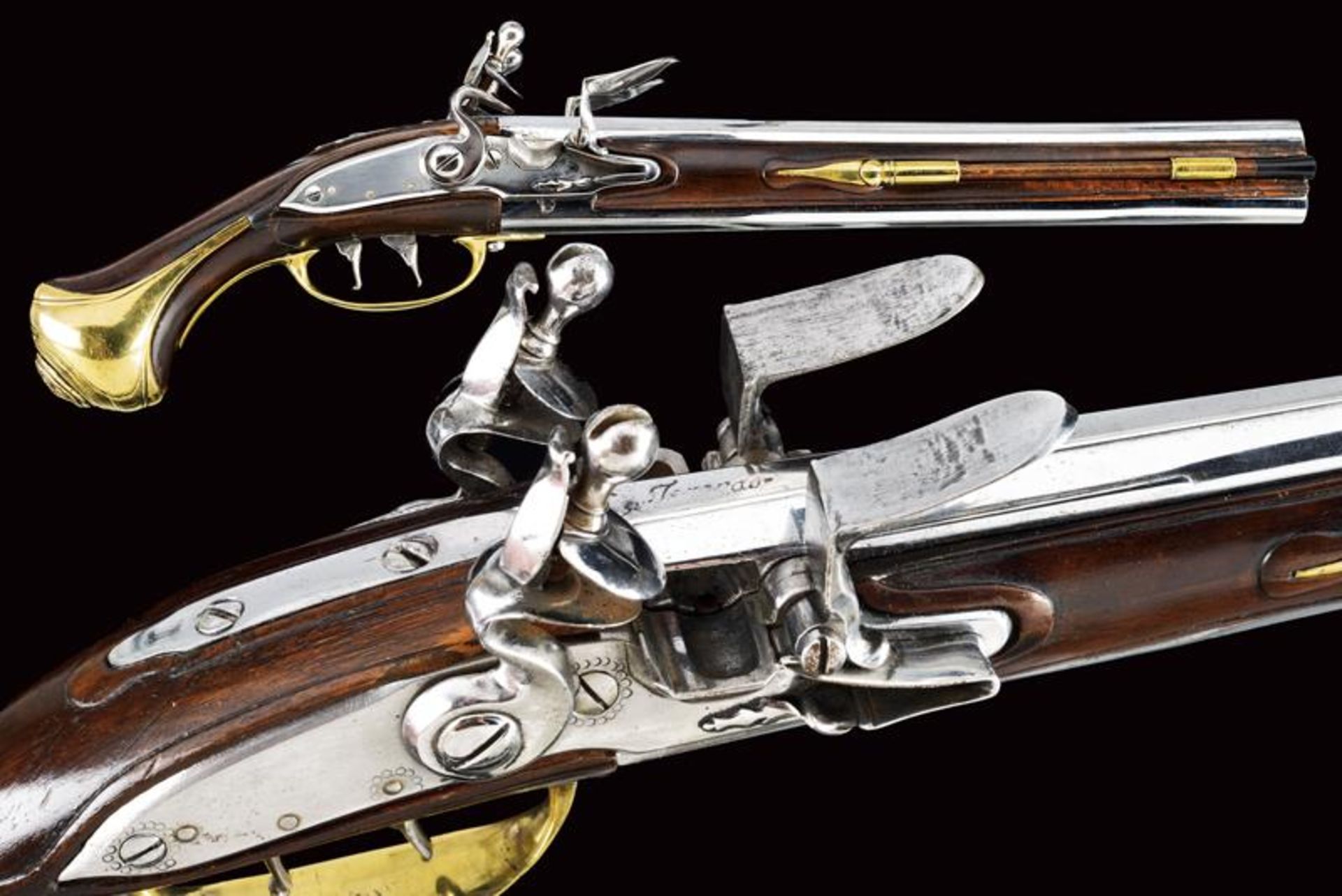 An over-and under-barreled flintlock pistol