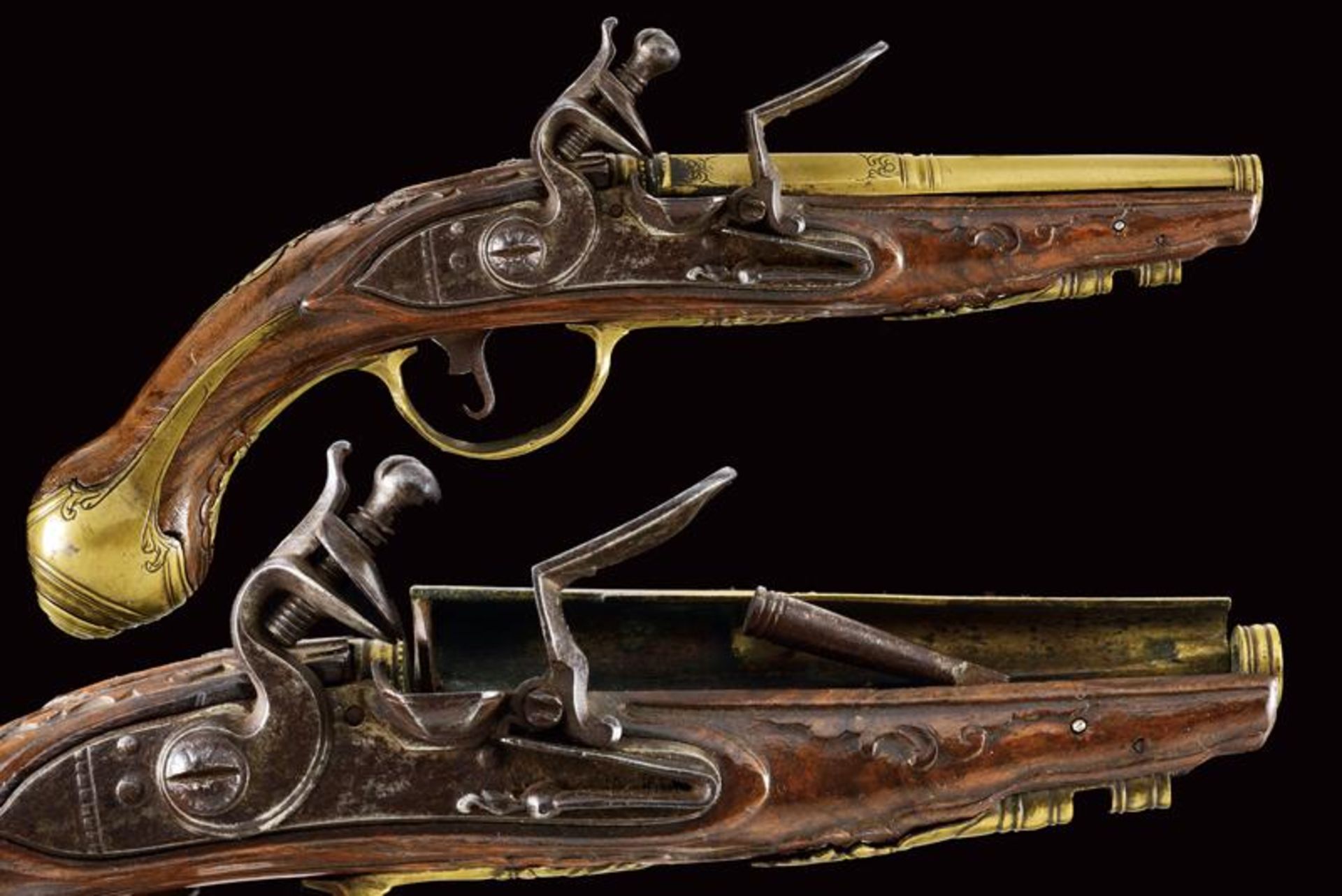 A pistol-shaped flintlock lighter