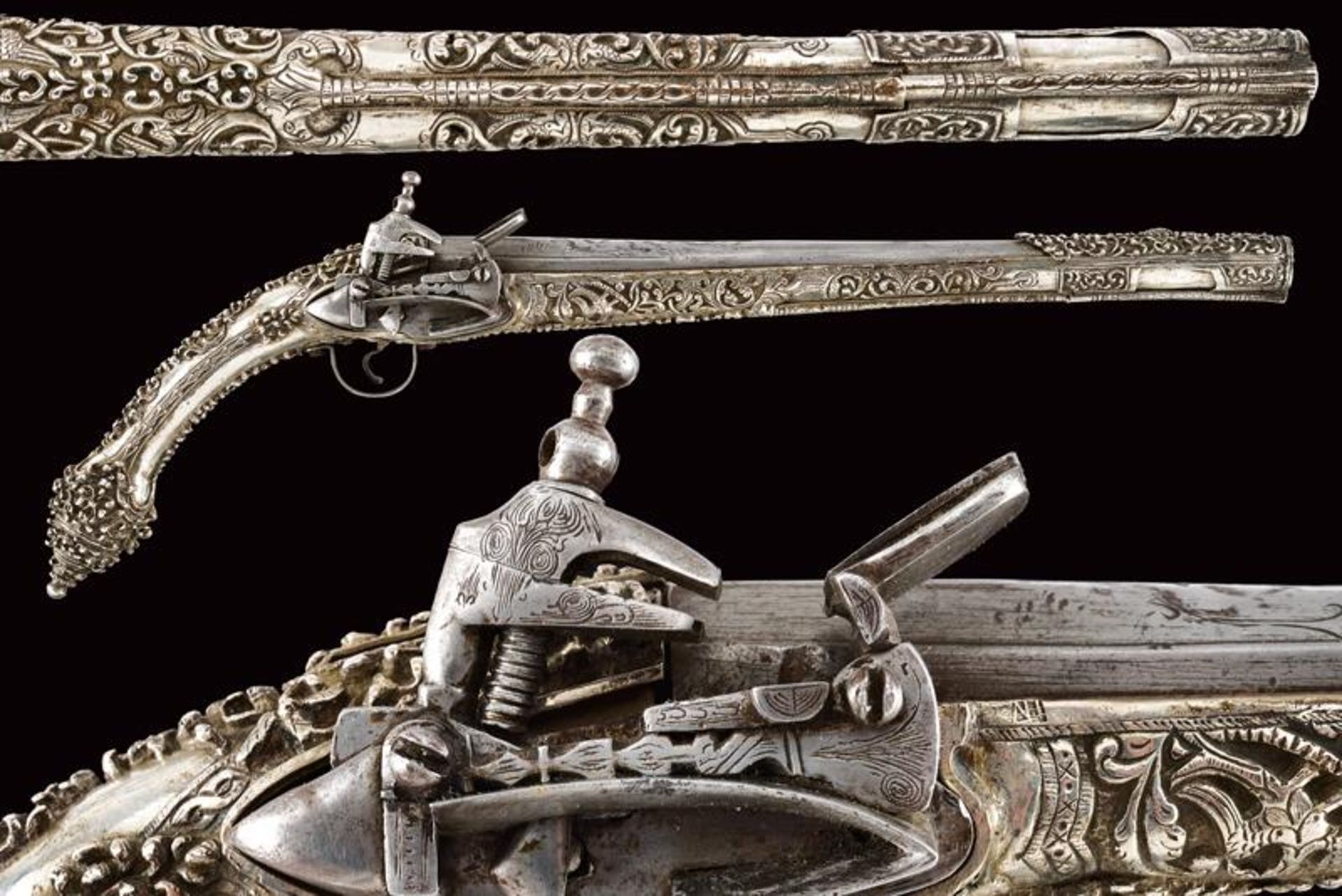 A fine silver-mounted flintlock pistol