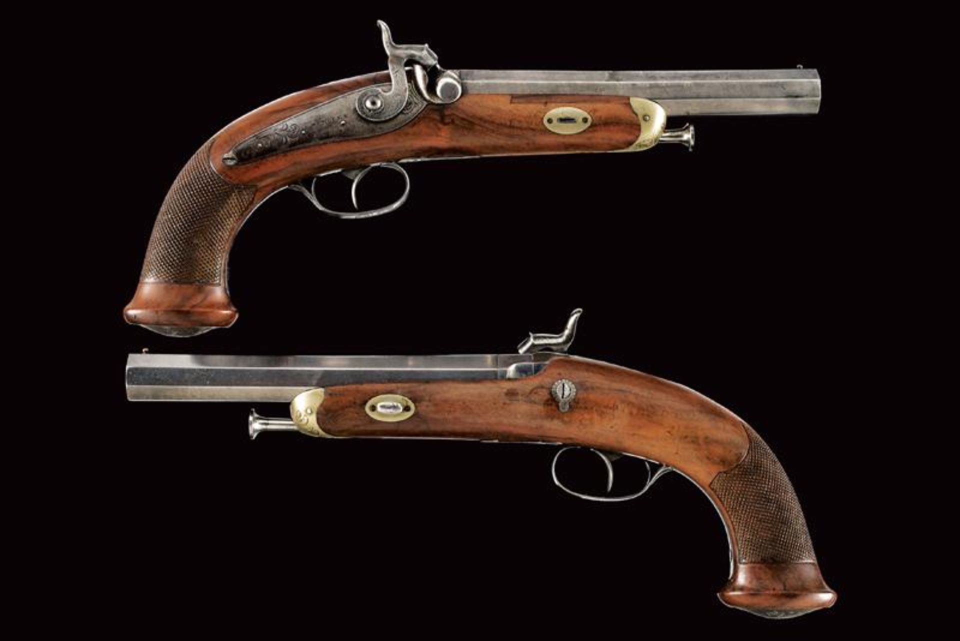 A pair of percussion pistols by Merolla