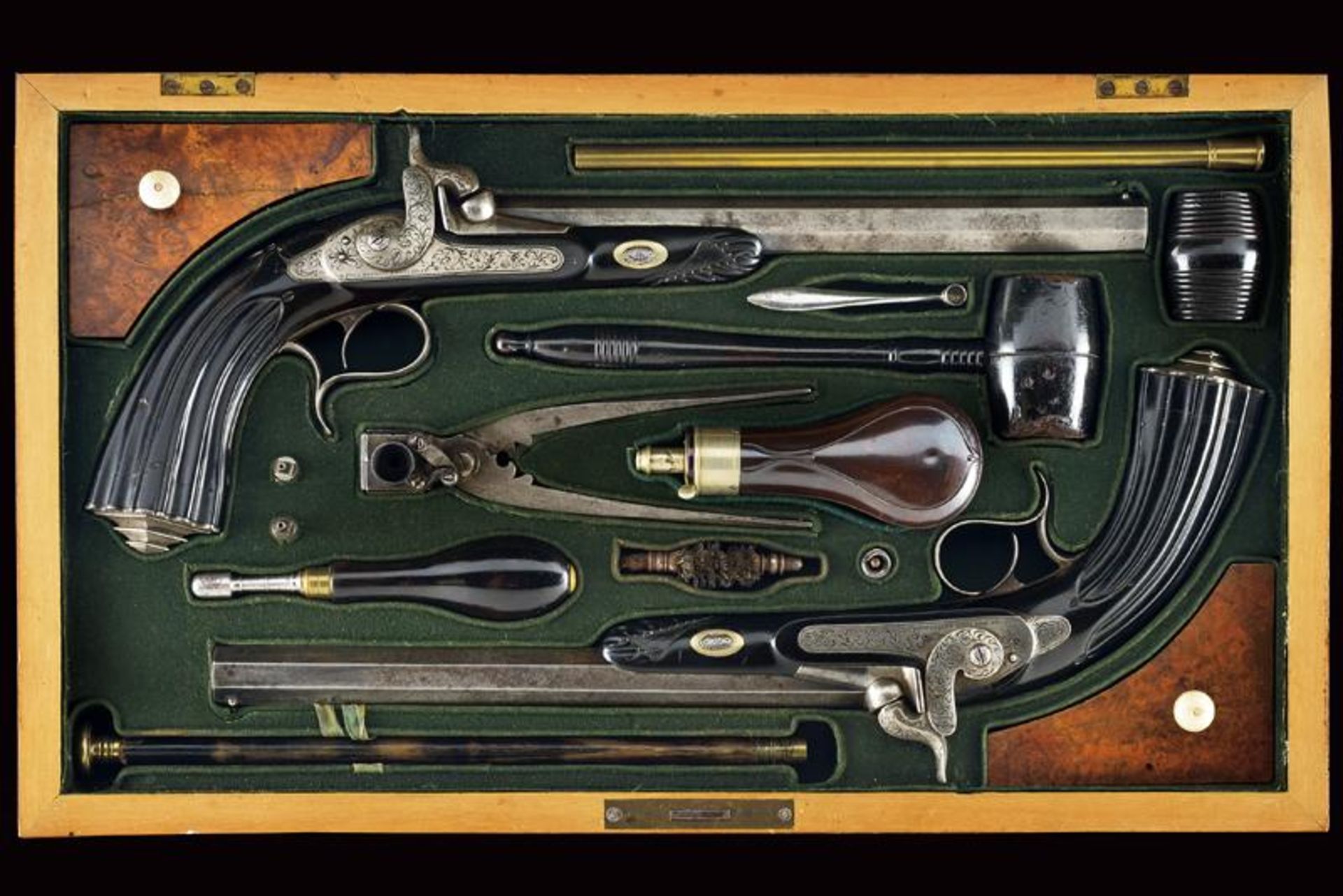A pair of cased percussion pistols by Donaghy in Amsterdam