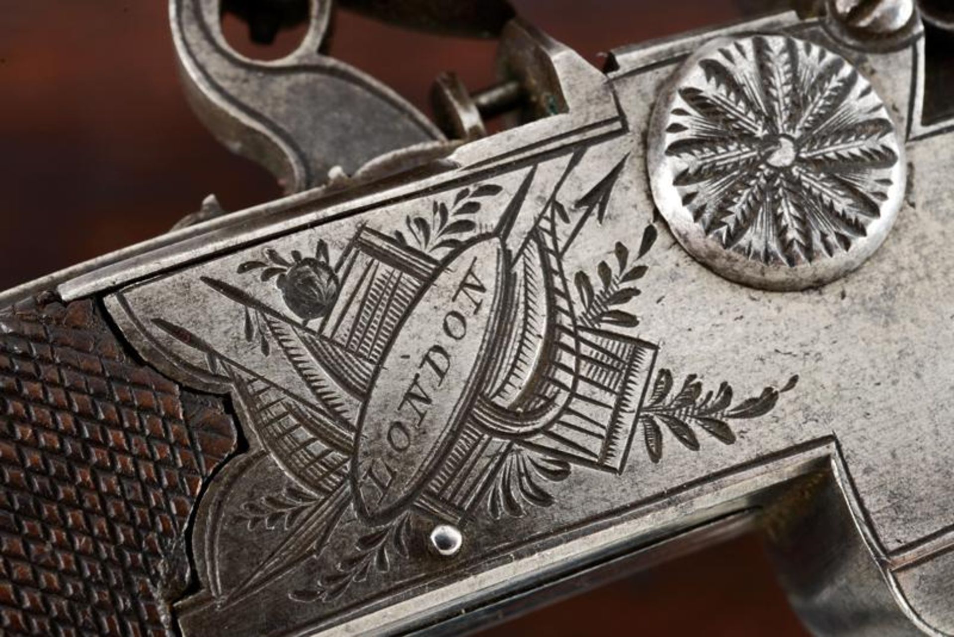 A cased over-and-under-barrelled flintlock pocket pistol by Jones & Co. - Image 4 of 6