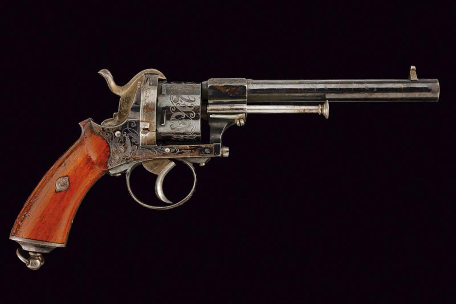 A pin-fire revolver