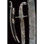 A silver-mounted sabre with important Persian blade