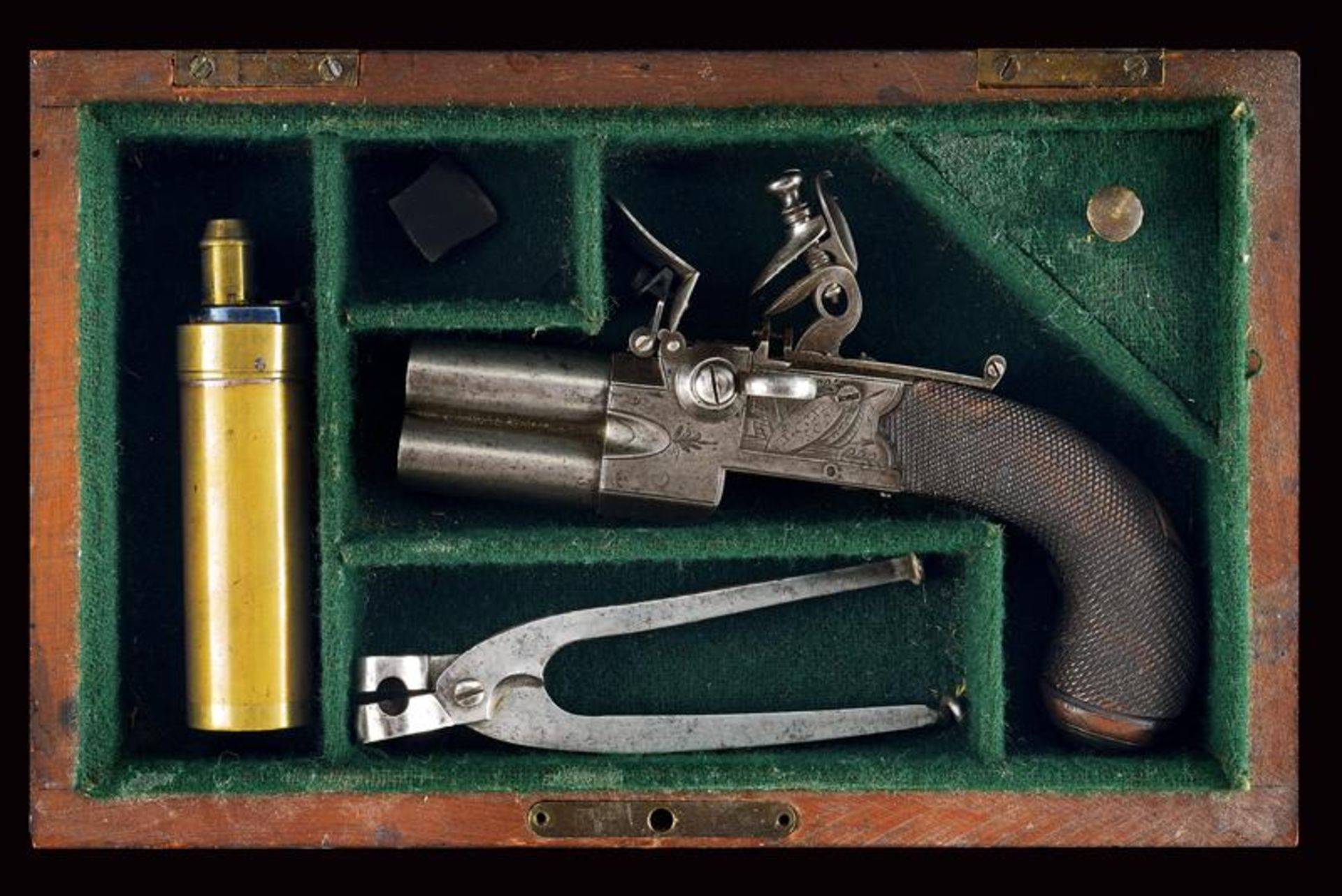 A cased over-and-under-barrelled flintlock pocket pistol by Jones & Co.
