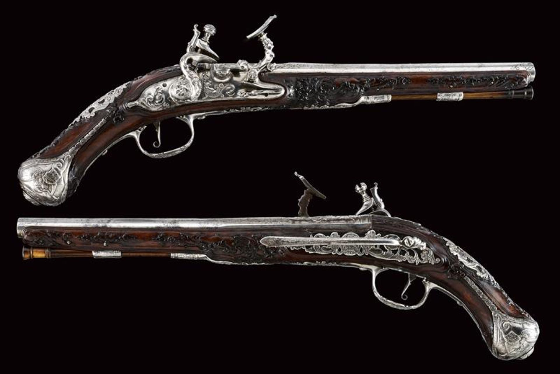 A beautiful pair of snaphaunce lock pistols signed by master G.G.