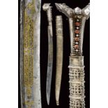 An elegant silver-mounted yatagan