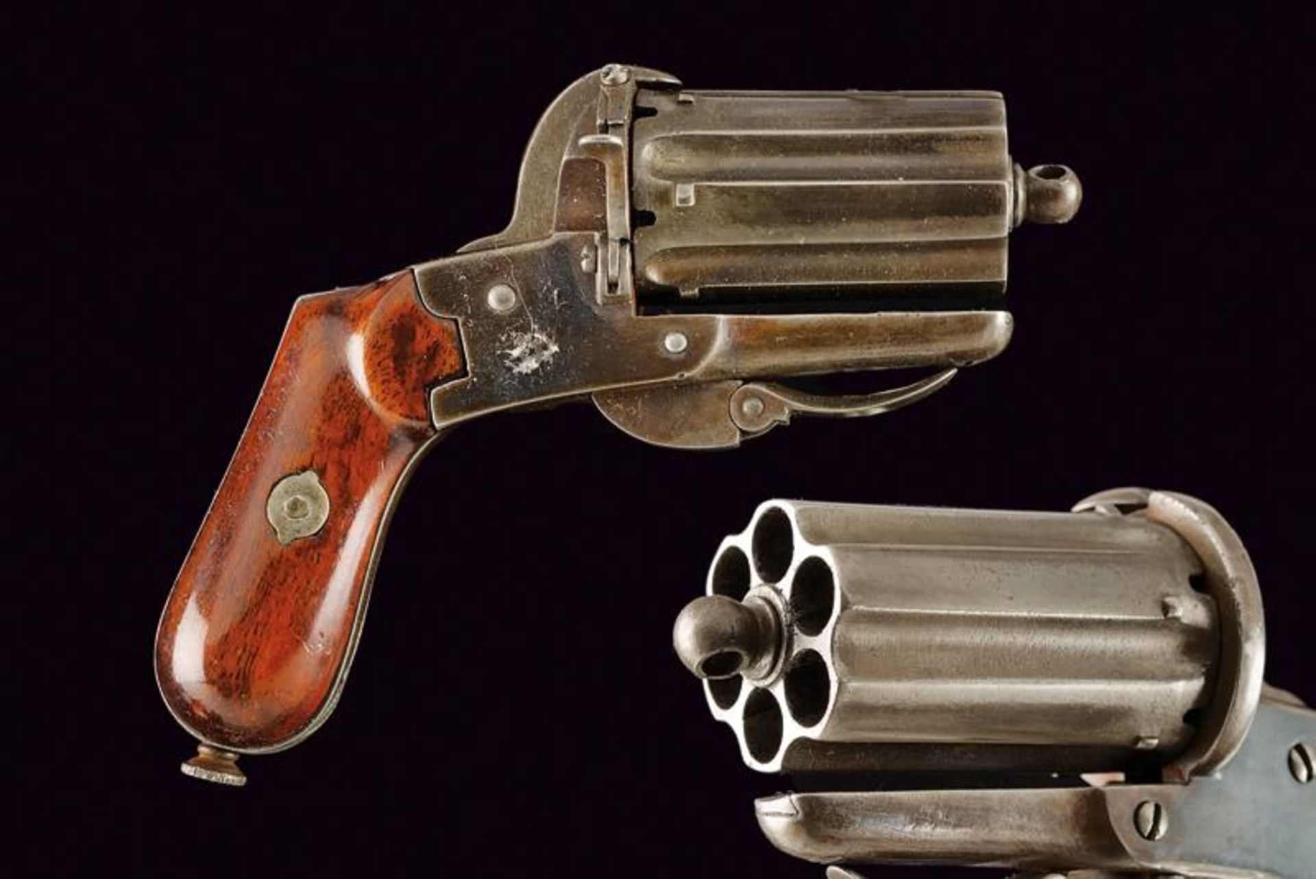 A pin-fire pepperbox revolver