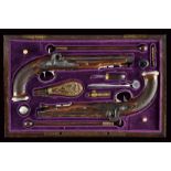 A rare pair of cased percussion pistols from the Factory of Versailles