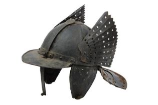 A winged lobster-tailed helmet