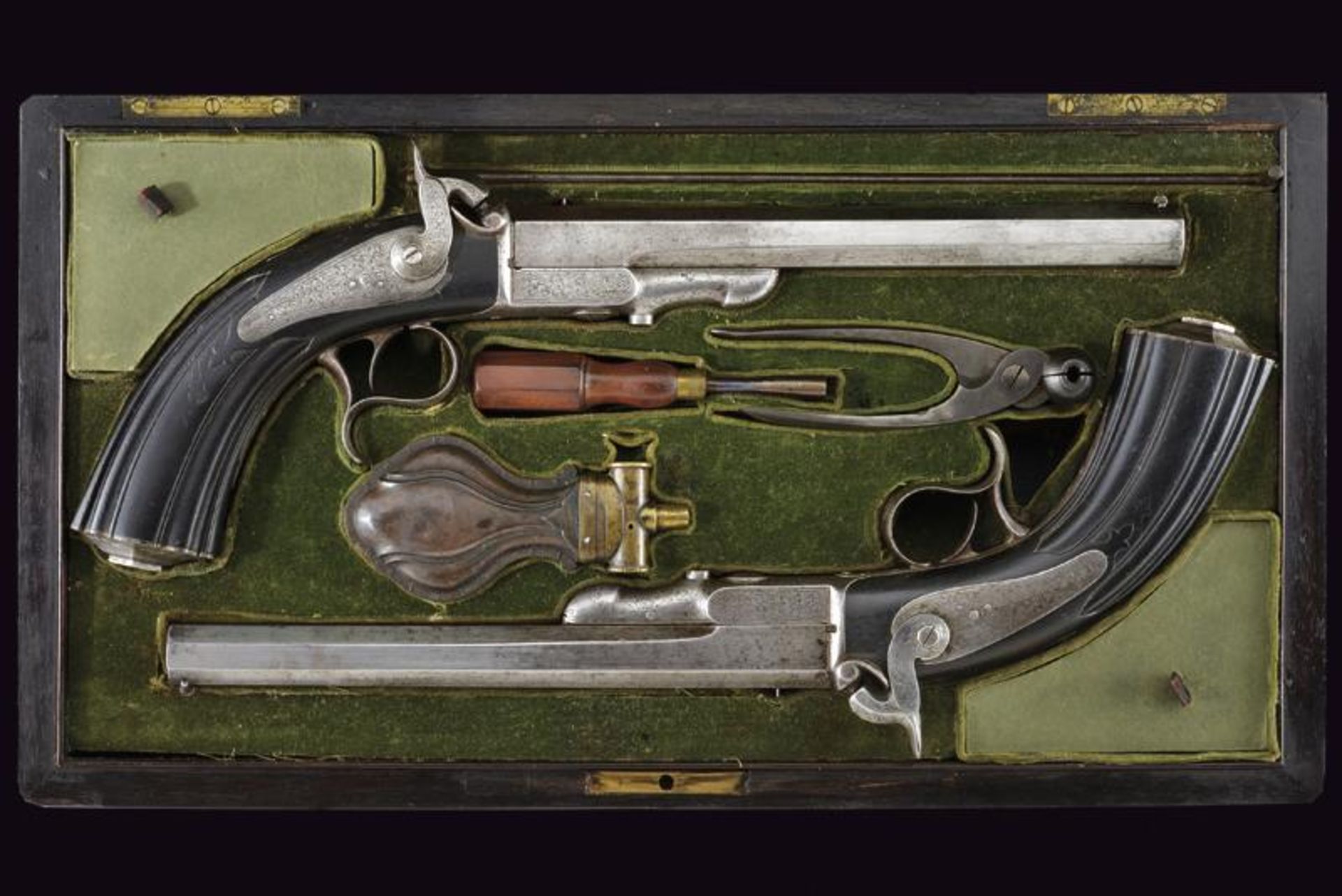 An interesting and rare pair of cased percussion pistols by Lepage