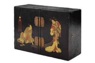 A lacquered wooden box with trays