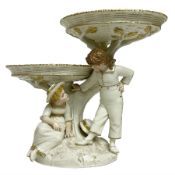 Royal Worcester figural double comport in the style of Kate Greenaway
